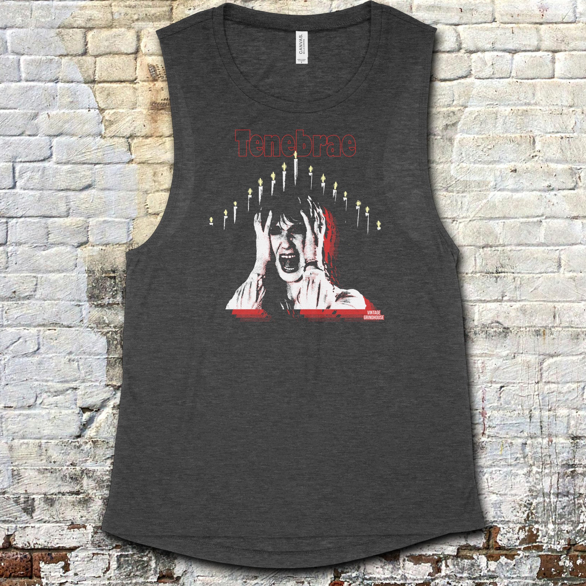 Tenebrae muscle tank with graphic of screaming woman framed by candles and bold red title on dark gray fabric