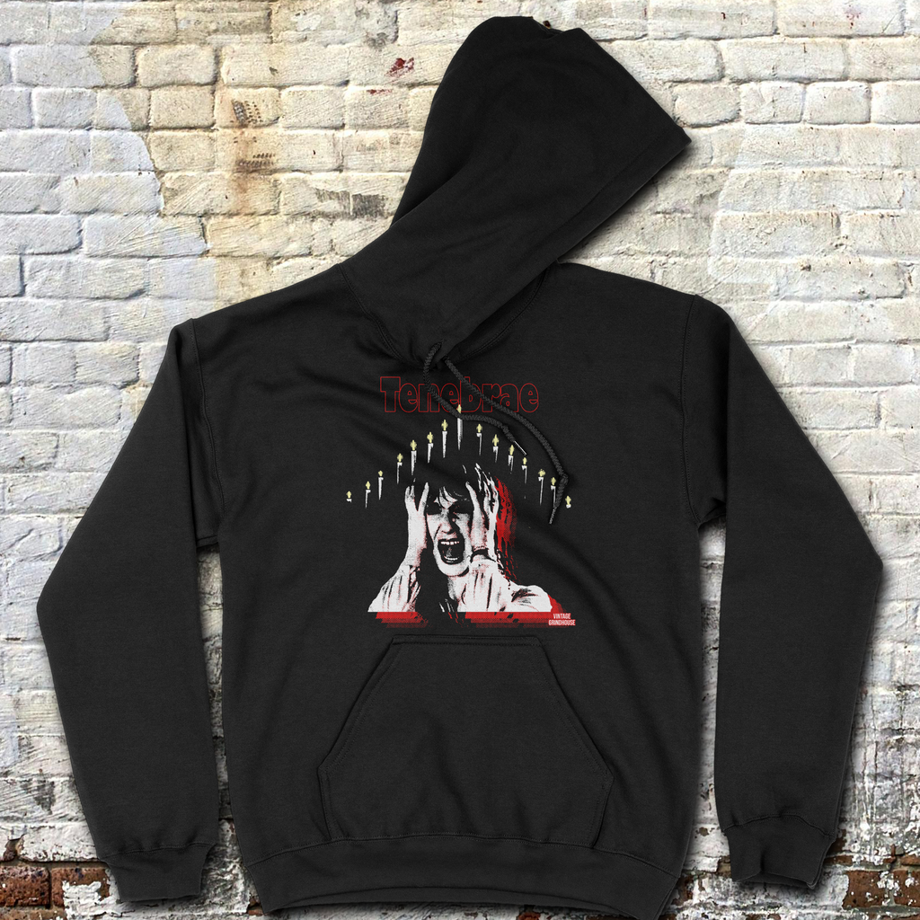 Tenebrae hoodie featuring a screaming woman surrounded by lit candles with distressed red and white horror text design on black fabric