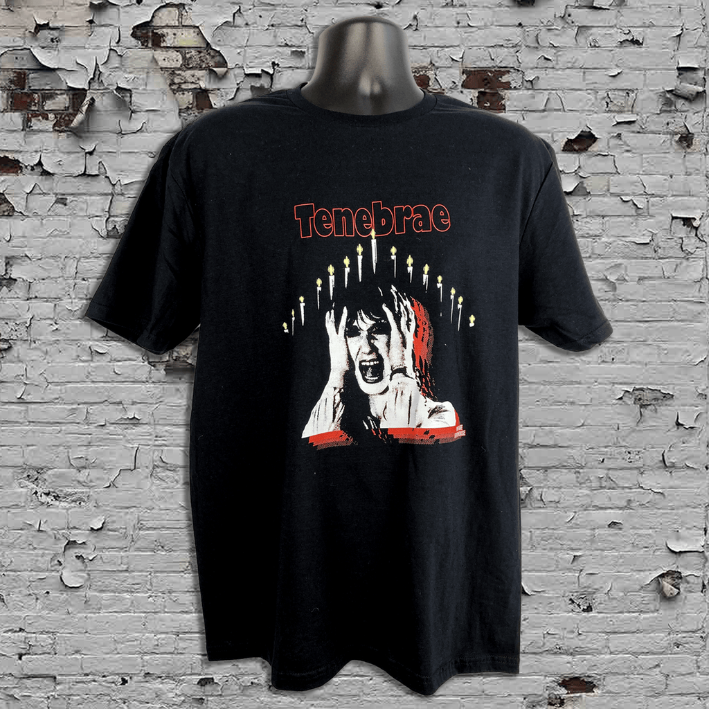 Black t-shirt with graphic design and 'Tenebrae' text on a textured wall background