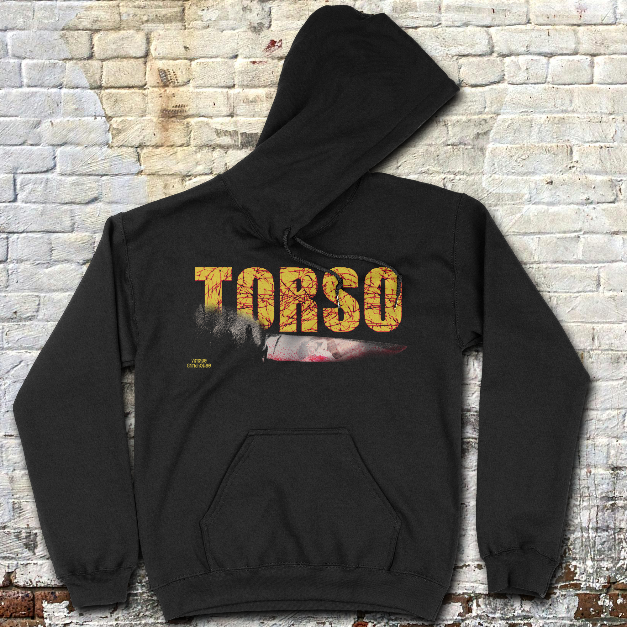 Torso hoodie featuring distressed yellow text with a partially obscured face on black fabric background
