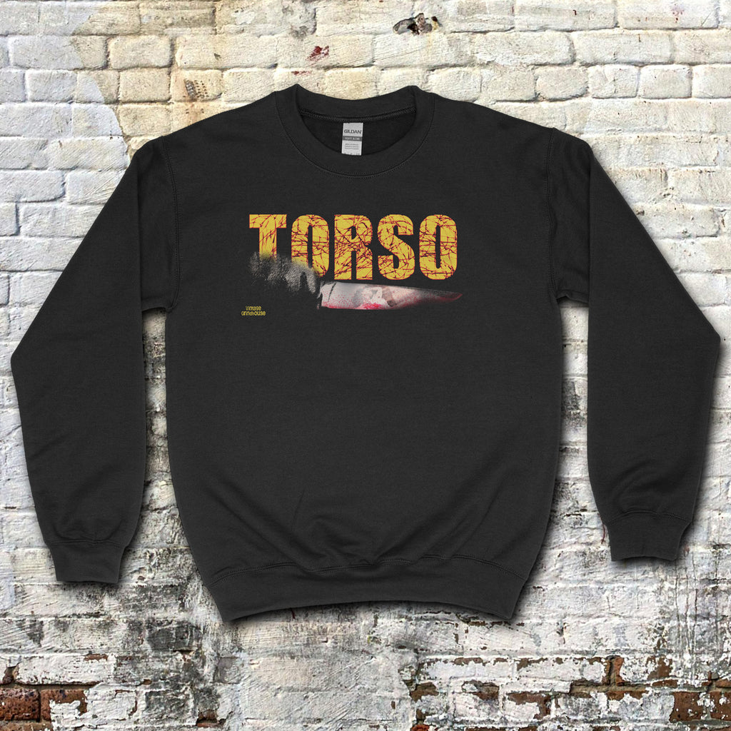 Torso sweatshirt with distressed yellow text and graphic of a bloody knife on black fabric against brick wall background