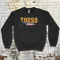 Torso sweatshirt with distressed yellow text and graphic of a bloody knife on black fabric against brick wall background