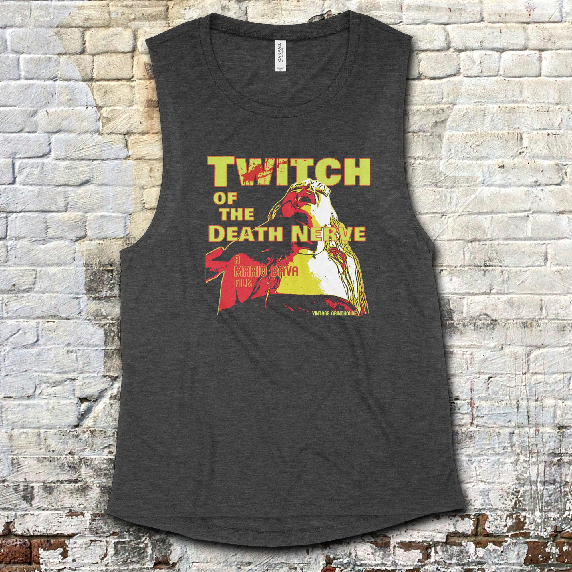 Twitch of the Death Nerve muscle tank with vintage horror movie poster style graphic in bold yellow and red tones on dark fabric