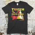 Black t-shirt with Twitch of the Death Nerve graphic design and text on a brick wall background