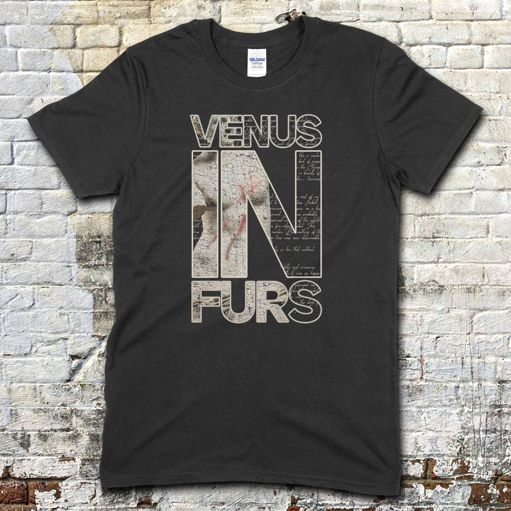 Venus in Furs t-shirt in black with large distressed text featuring vintage script and artistic splatter design