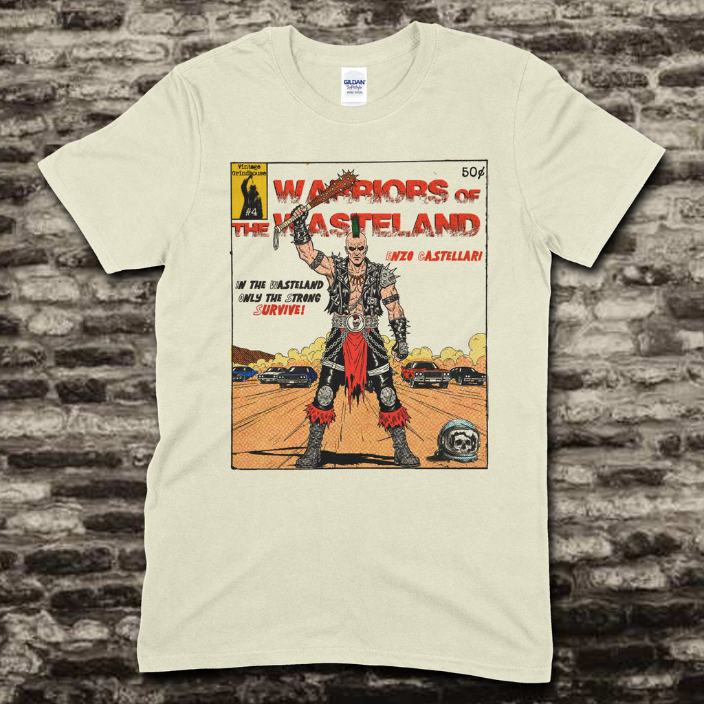 Beige t-shirt featuring a comic book cover style graphic of Warriors of the Wasteland with a post-apocalyptic warrior and cars.