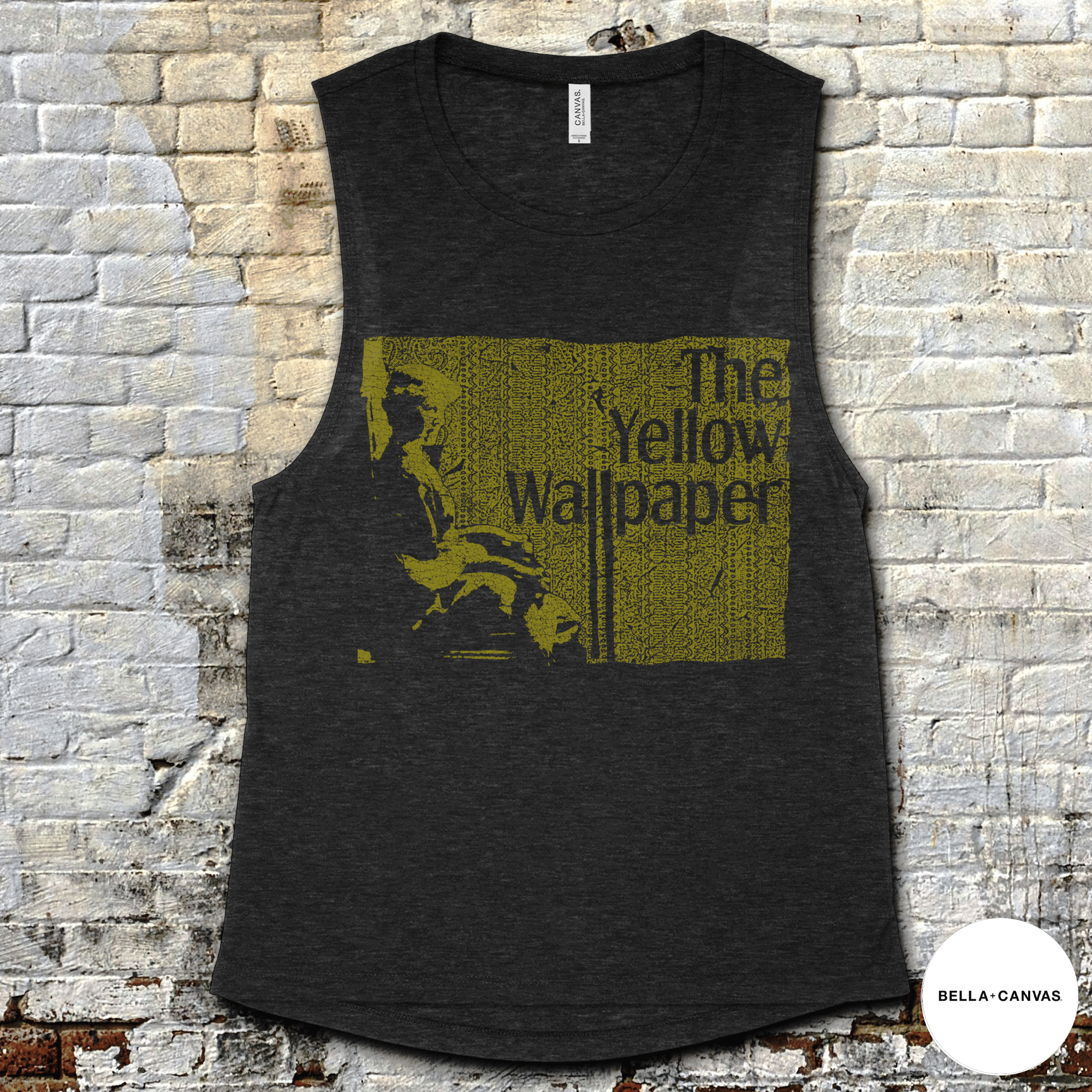 The Yellow Wallpaper muscle tank in dark fabric with vintage-style yellow graphic and distressed text design