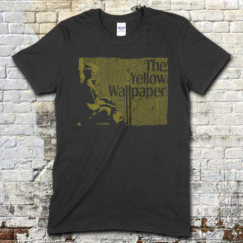 Dark gray t-shirt with vintage-style yellow block print featuring a seated figure and The Yellow Wallpaper text