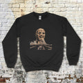 Black Zombi 2 sweatshirt with vintage horror graphic of a decayed zombie head over a cityscape and road