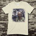 Zombie tribute t-shirt featuring hand-drawn zombie figure with graveyard and crosses in eerie nighttime scene